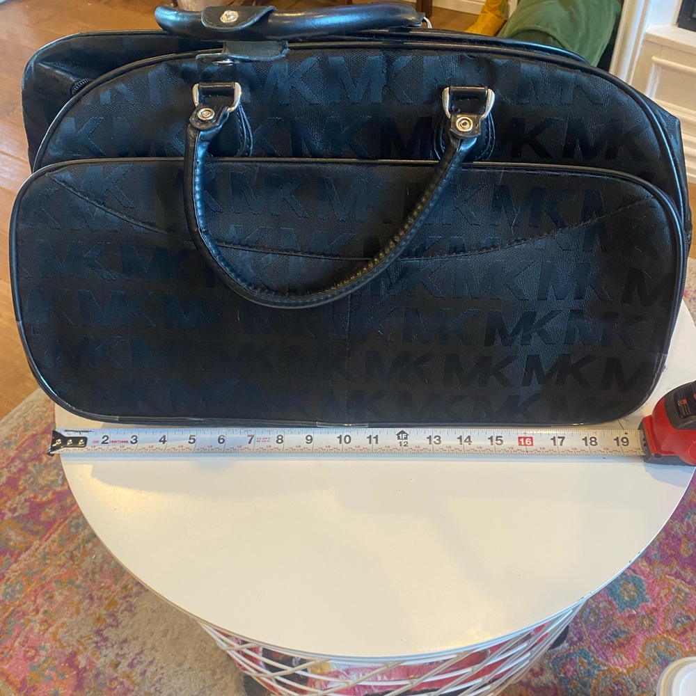 Black Michael Kors bag.